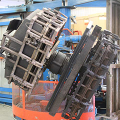 Casted mold spinning in a rotational molding oven at Advanced Plastics Rotomolding in Swanville, MN