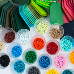 Samples of colored plastic pelets used for rotational molding