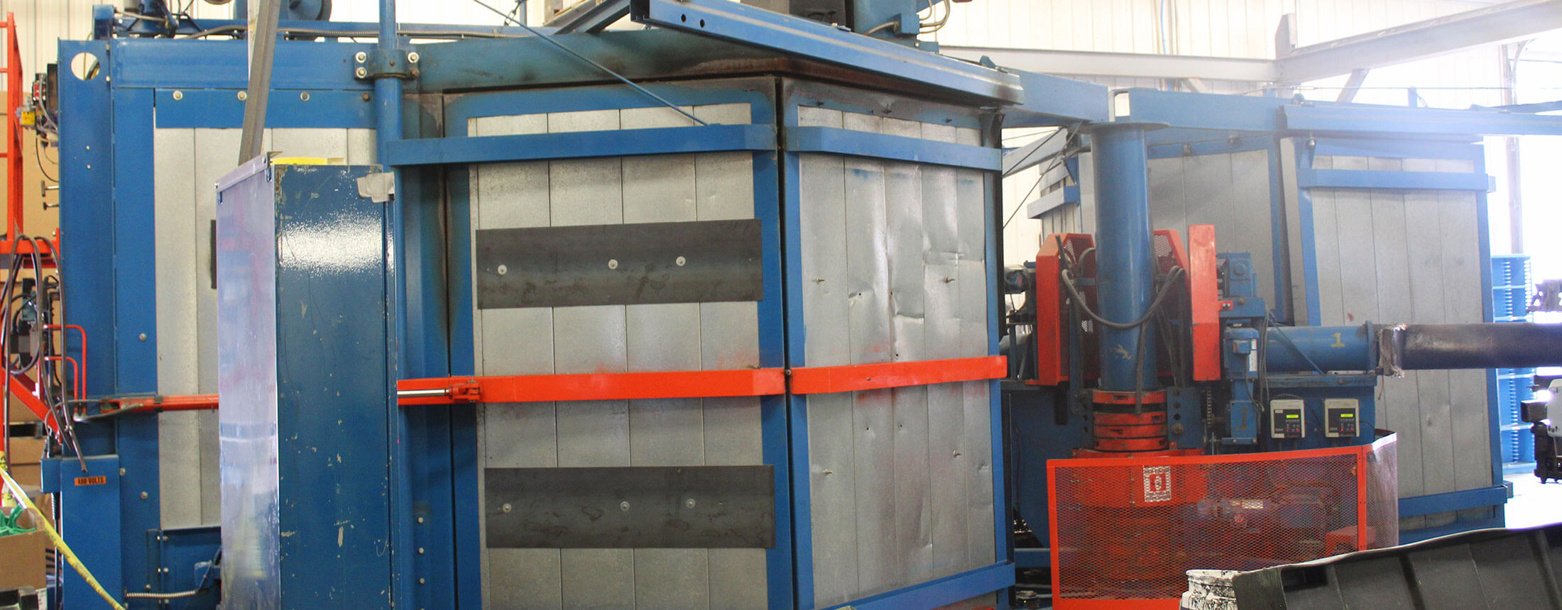 Rotational molding machine at Advanced Plastics Rotomolding in Swanville, MN