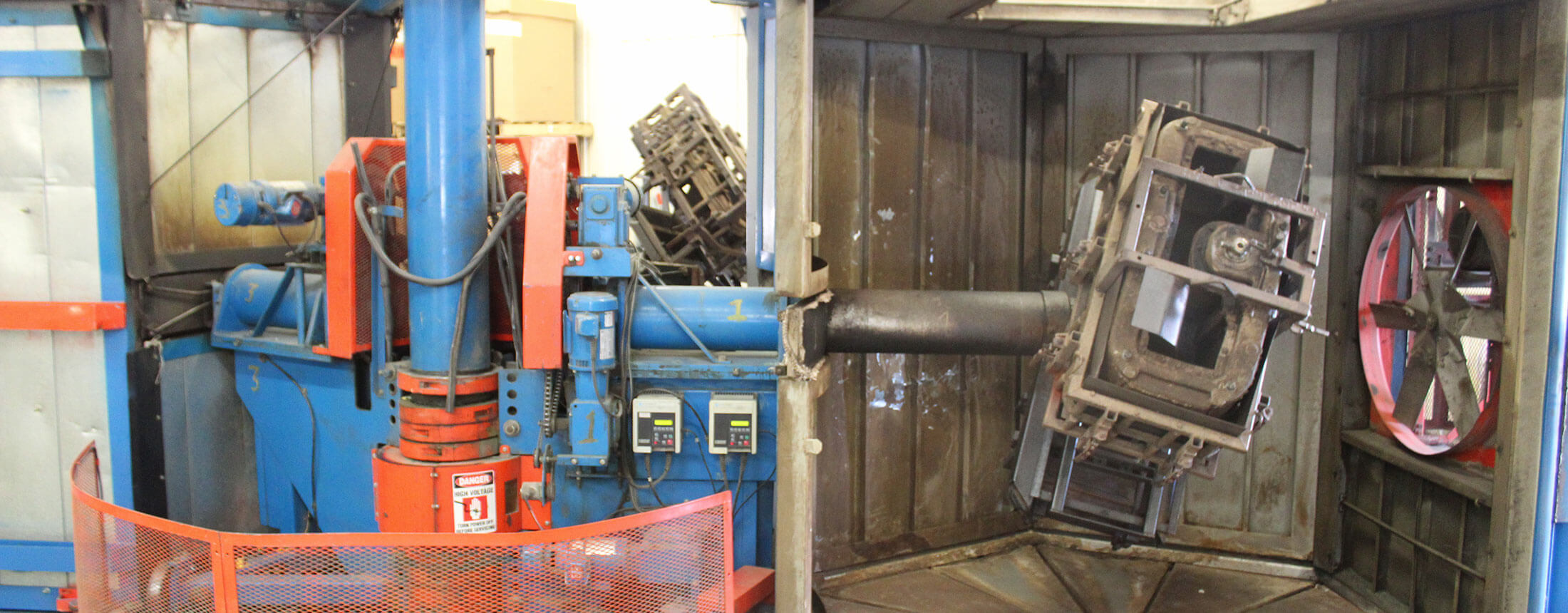 Casted mold spinning inside a rotational molding oven at  Advanced Plastics Rotomolding in Swanville, MN